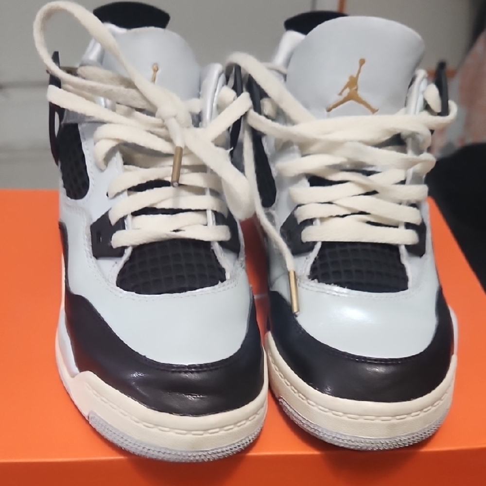 Nike Kids Black and White Sneakers with Gold Accents